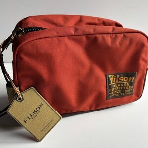 Filson Travel Pack NWT
Color Rust